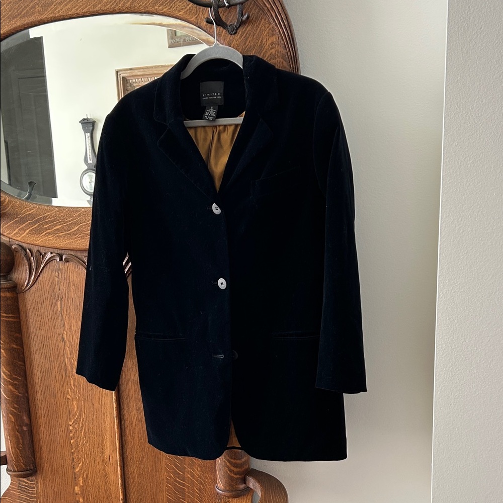 Limited black velvet blazer. Bust 20”. Length 30” Arms 22” 
Flap in back